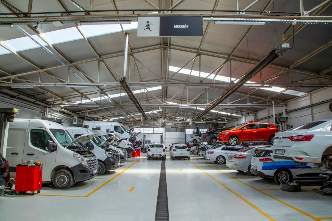 Vehicle repair workshop with cars undergoing body repair